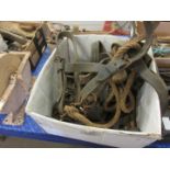 Box containing various vintage horse harness and bits, stable logs, etc