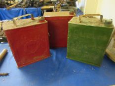 Three vintage petrol cans including shell, shellmex