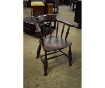ELM HARD SEATED CAPTAIN S CHAIR WITH SPINDLE BACK ON AN H STRETCHER