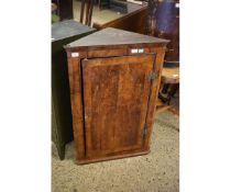 LATE 18TH CENTURY MAHOGANY CORNER CUPBOARD, CROSS BANDED DOOR ENCLOSING AN INTERIOR OF FITTED SHAPED