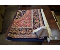 GOOD QUALITY MODERN CAUCASIAN TYPE CARPET WITH CENTRAL FLORAL LOZENGE WITH BLUE GROUND AND CREAM