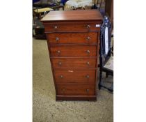 CHERRY WOOD WELLINGTON TYPE CHEST FITTED WITH SIX DRAWERS WITH BRASS KNOB HANDLES