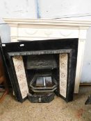 WHITE PAINTED PINE FIRE SURROUND WITH URN AND SWAG DETAILS, TOGETHER WITH A CAST IRON FIRE INSERT