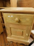 PINE FRAMED BEDSIDE CHEST WITH SINGLE DRAWER AND PANELLED CUPBOARD DOOR