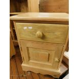 PINE FRAMED BEDSIDE CHEST WITH SINGLE DRAWER AND PANELLED CUPBOARD DOOR