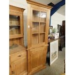 MODERN OAK FRAMED FLOOR STANDING CORNER CUPBOARD WITH SINGLE GLAZED DOOR OVER PANELLED DOOR WITH