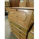 PINE FRAMED DROP FRONTED BUREAU FITTED WITH FOUR DRAWERS WITH KNOB HANDLES