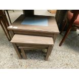 MELAMINE NEST OF THREE TABLES WITH GLASS INSERTS