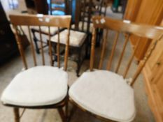 PAIR OF BEECHWOOD HARD SEATED STICK BACK KITCHEN CHAIRS