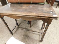 MID-20TH CENTURY OAK FRAMED FOLD-OVER CARD TABLE WITH GREEN BAIZE INTERIOR ON BOBBIN TURNED SUPPORTS