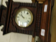 WALNUT CARVED MANTEL CLOCK WITH ARABIC CHAPTER RING