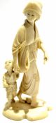 Japanese Meiji period ivory Okimono modelled as a lady with child by her side, 14cm high