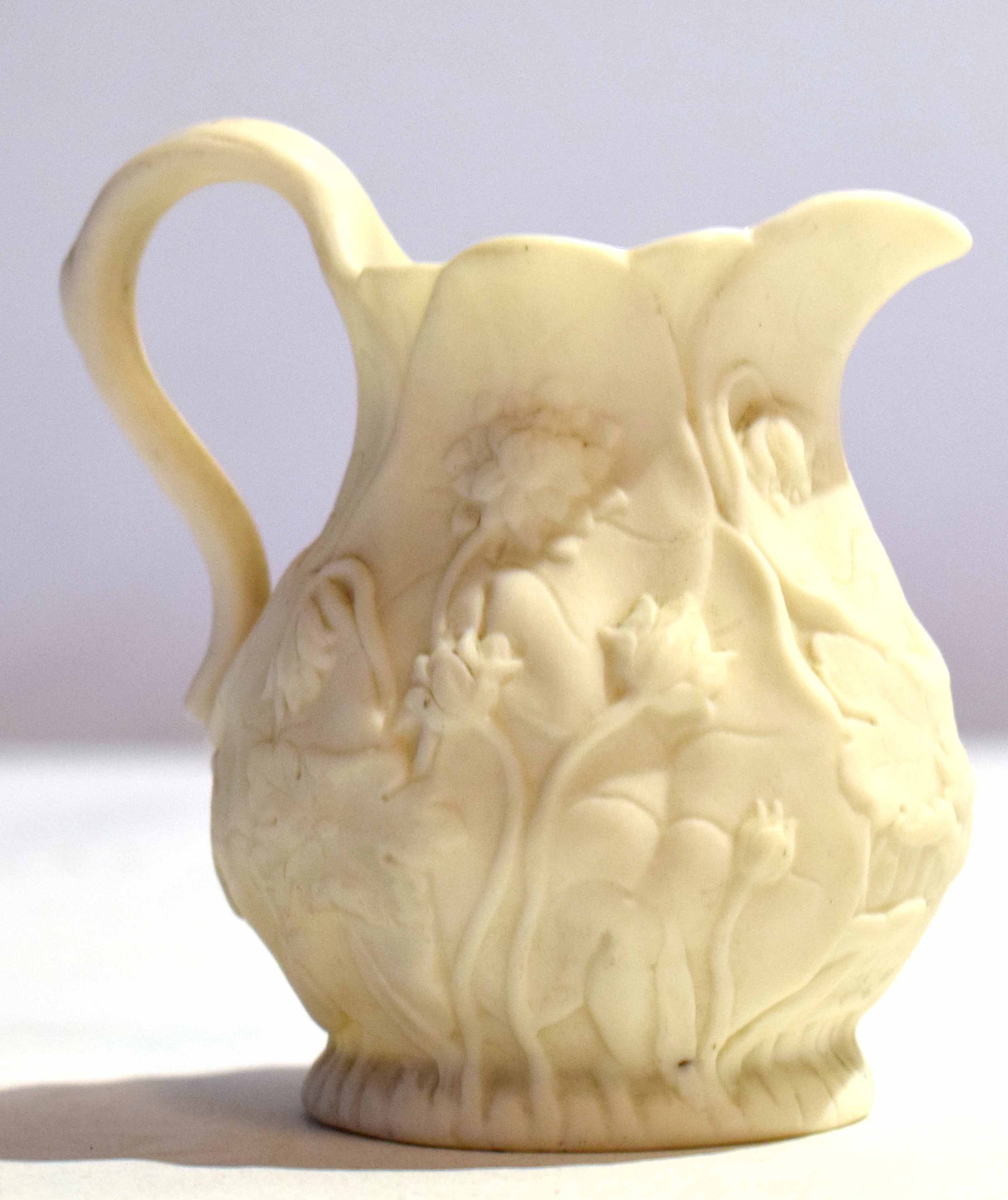 19th century Parian porcelain jug modelled with flowerheads, 7cm high