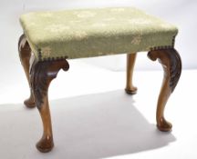 Mahogany stool, rectangular top raised on heavy cabriole supports moulded at the knees with acanthus