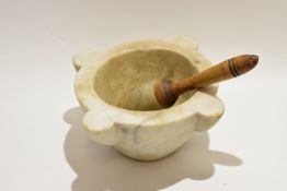 Antique white marble pestle and mortar, the pestle with turned wooden handle