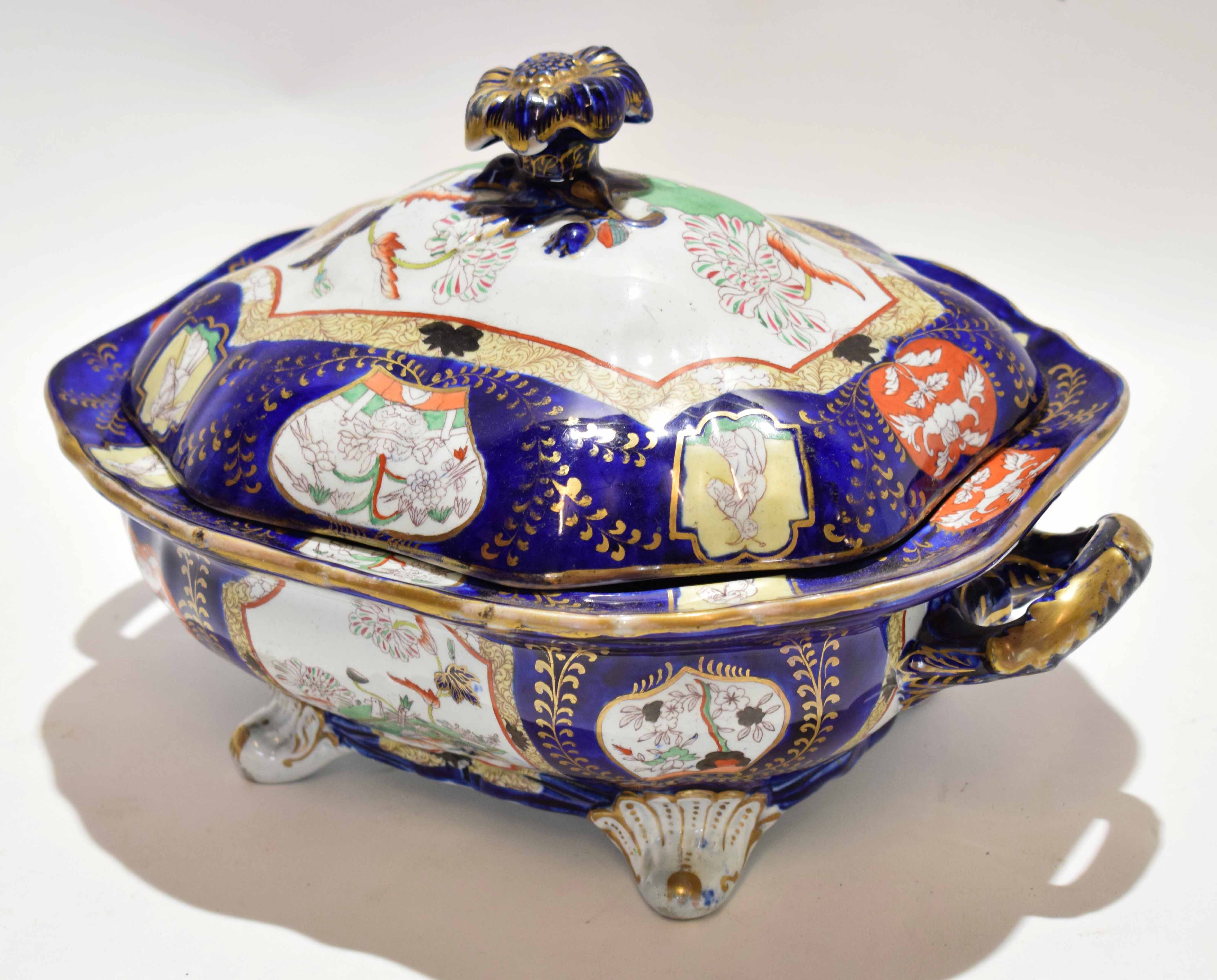 Large Mason's mid-19th century tureen and cover, the blue ground decorated with various panels of