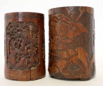 Pair of Chinese bamboo brush pots, one with oval panels of dignitaries in a landscape and some