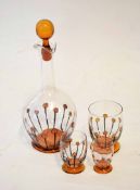 French globe and shaft decanter with enamelled naive type flowers in black and brown, together