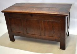 18th century oak coffer with three panelled front on plain stile supports, 121cm wide