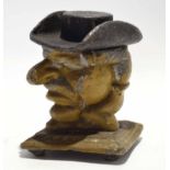 19th century painted tobacco jar formed as a head with lift off hat, standing on a square base, 10cm