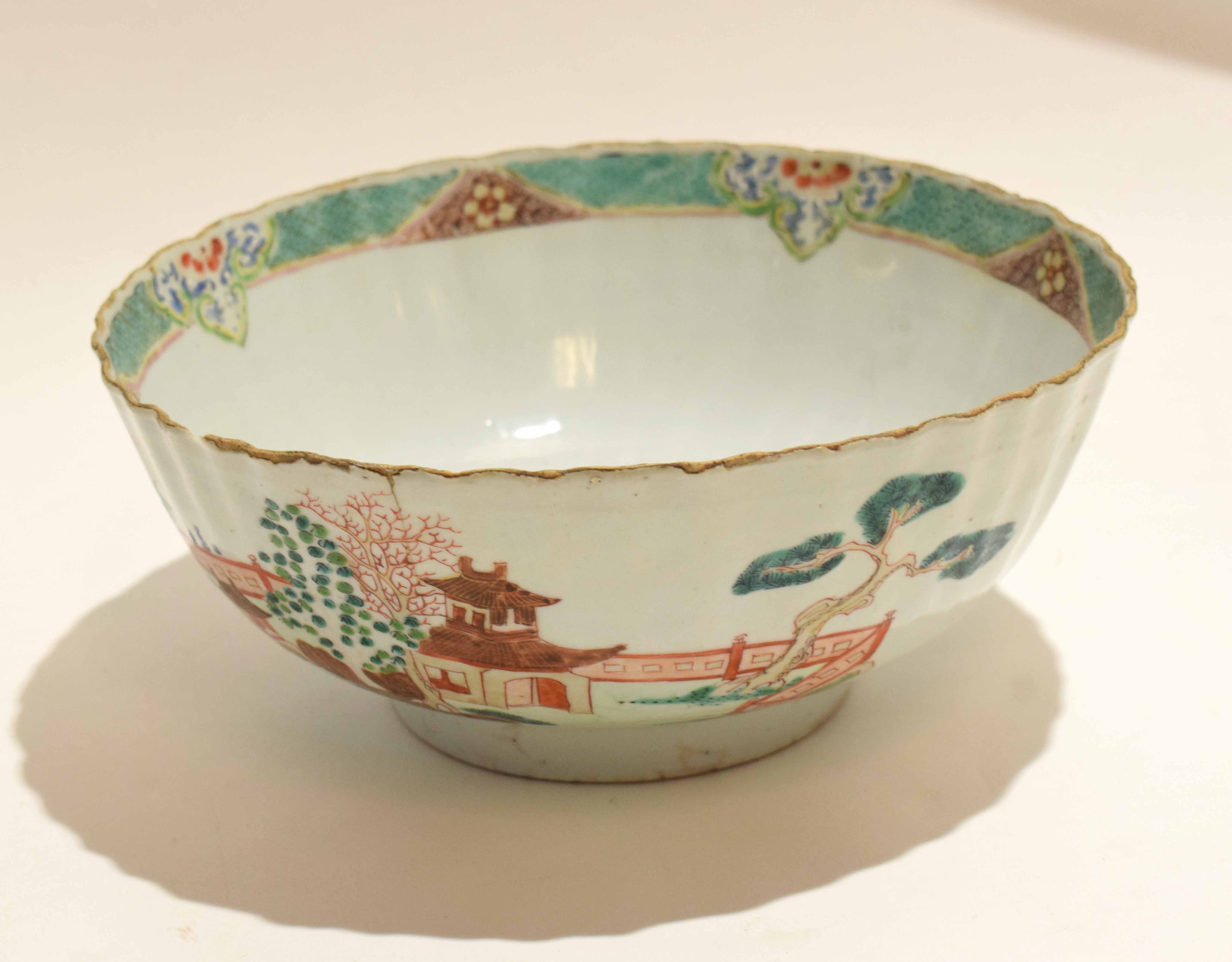 18th century lobed Chinese porcelain bowl with polychrome decoration of landscape scenes, 24cm diam