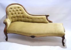 Victorian mahogany framed chaise longue with beige upholstery and button back, scrolling arms