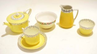 Part tea service by Grimwade comprising tea pot and sugar bowl, jug and a further beaker and tea cup