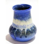 Ruskin ware vase dated 1930, the blue stippled ground with a streaked design, 13cm high