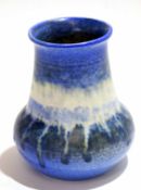 Ruskin ware vase dated 1930, the blue stippled ground with a streaked design, 13cm high