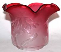 Late 19th century cranberry glass oil lamp shade with a moulded floral design