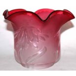 Late 19th century cranberry glass oil lamp shade with a moulded floral design