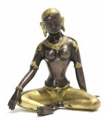 Metalware figure of a Hindu deity, picked out in gilt on a bronzed type torso