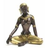 Metalware figure of a Hindu deity, picked out in gilt on a bronzed type torso