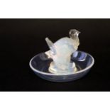 Small dish, the centre with a model of a turkey in opalescent colour, the base signed R Lalique,