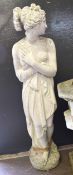 Large weathered composition statue of a shy maiden, 130cm high
