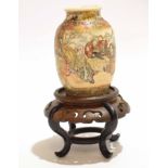 Satsuma earthenware vase with two panels, one with figures in a garden setting with a panel of