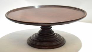Early 20th century mahogany lazy susan of typical circular form 46cm diam