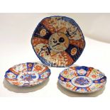 Collection of Japanese Imari ceramics comprising a large dish and two further dishes, largest dish