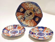 Collection of Japanese Imari ceramics comprising a large dish and two further dishes, largest dish