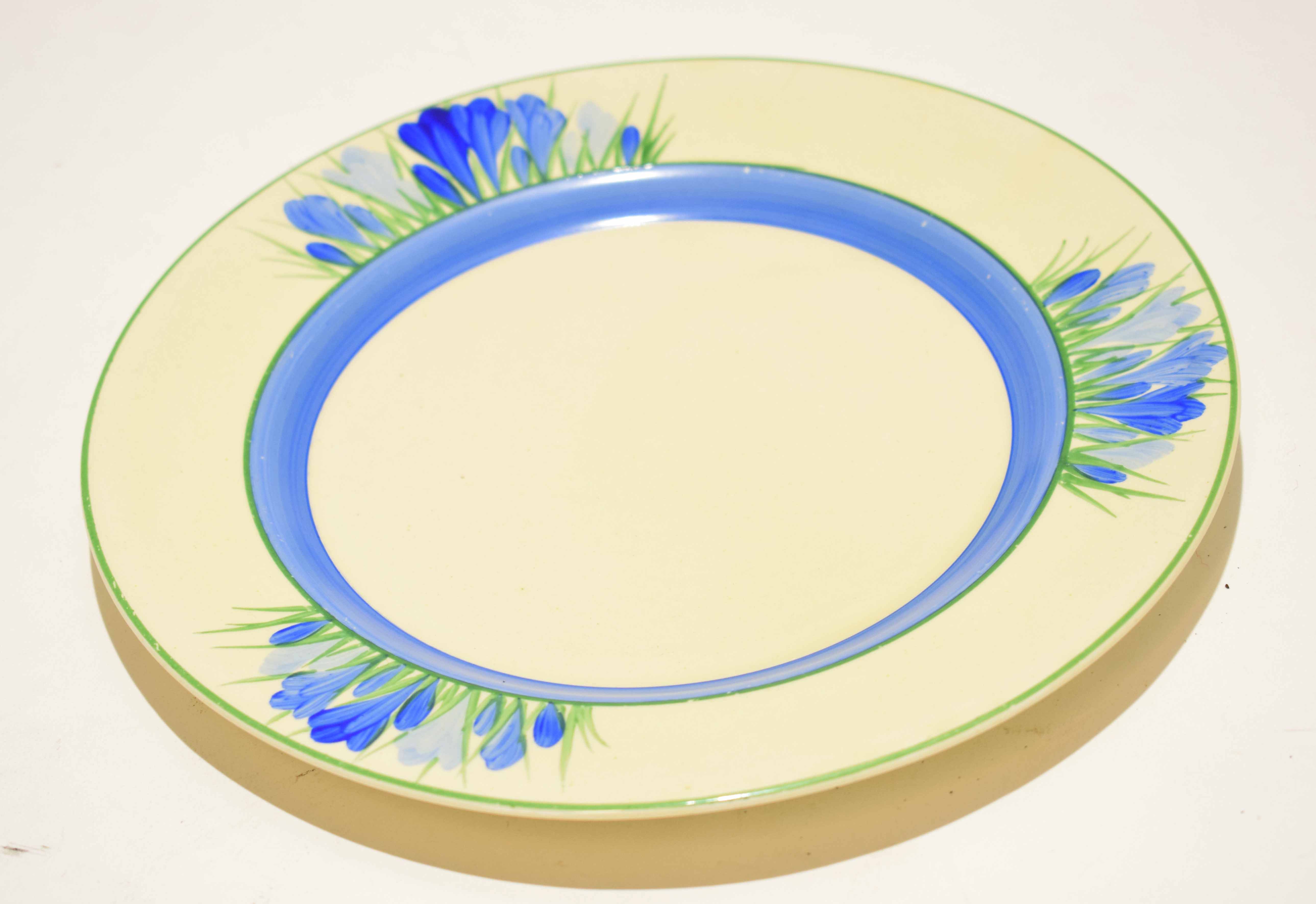 Clarice Cliff plate decorated in the blue crocus pattern with Clarice Cliff Bizarre back stamp to