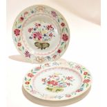 Pair of 18th century Chinese porcelain famille rose plates decorated with a vase and floral