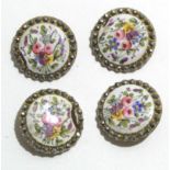 Group of four late 19th century gilt buttons, the centres with enamel decoration painted with floral