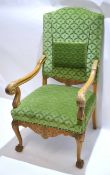 Good quality carved oak framed armchair with shaped green Dralon upholstered seat and back with