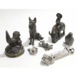 Group of metal animal models including a fledgling, a dog seated and pair of Oriental models of
