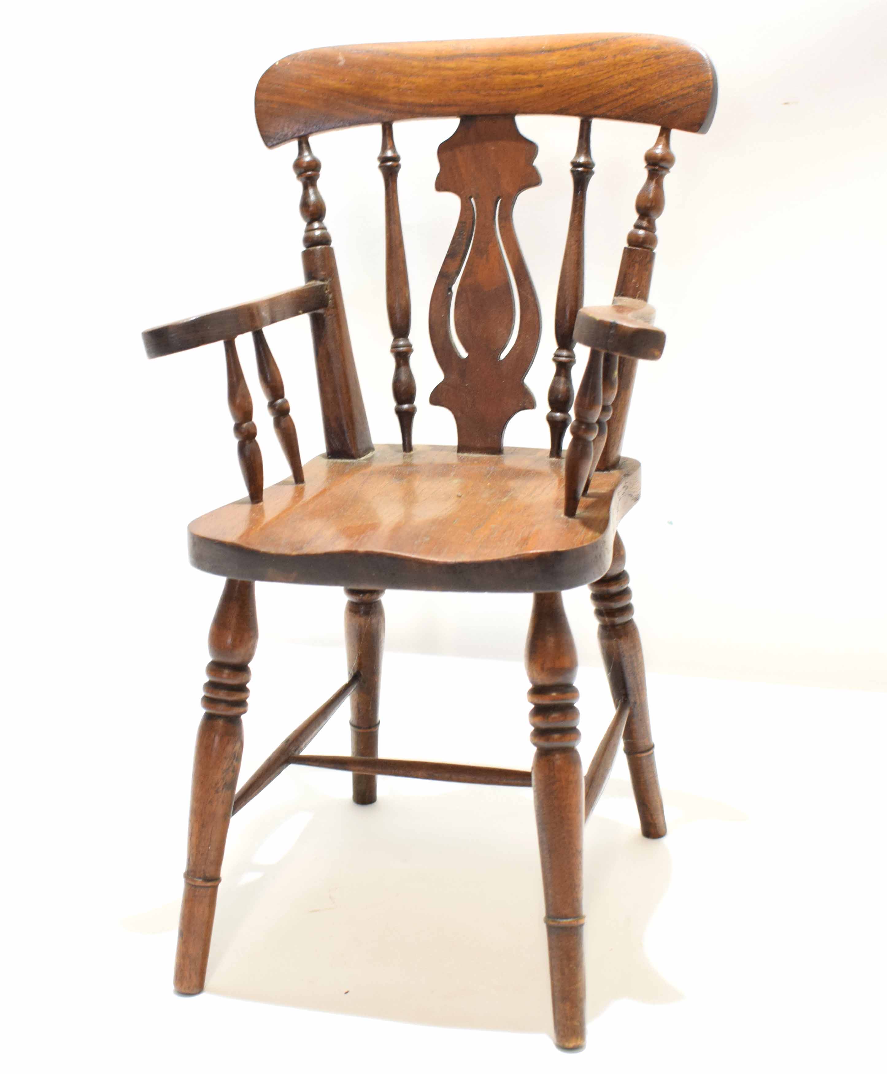 Small mahogany doll's armchair in the form of kitchen chair