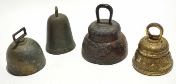 Box containing four various brass and metal table bells