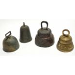 Box containing four various brass and metal table bells