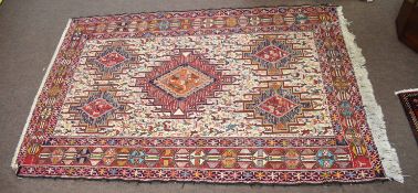 Good quality multi coloured carpet with cream centre and animal design, multi-gull border, 127cm