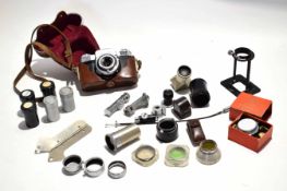 Group of camera equipment including a Zeiss Ikon camera in original case