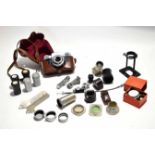 Group of camera equipment including a Zeiss Ikon camera in original case